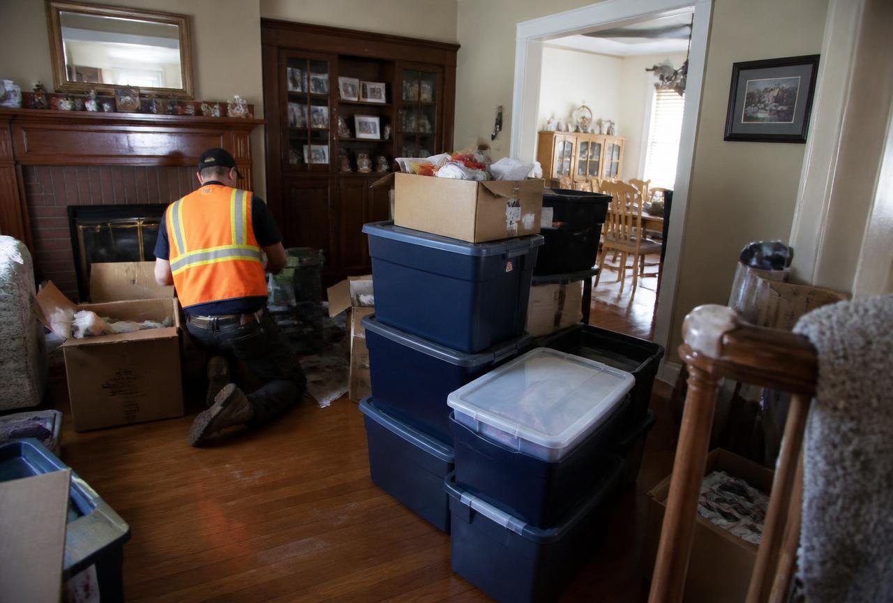 Genie Haul crew sorting a family home room by room during a documented estate cleanout.